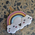 Friendly rainbow with cloud