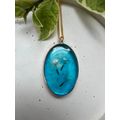 Gold oval