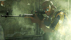 Soldier looking down a rifle with a scope attachment in 'Modern Warfare 2'