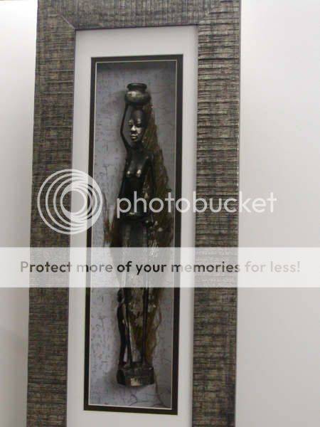 African Figure with silver highlights on palmbark