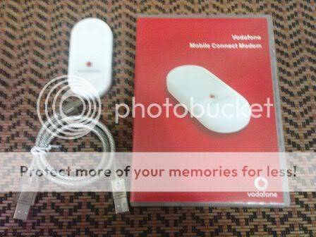 LIKE NEW VODAFONE E220 USB MODEM IN BOX INCLUDING ALL ACCESORIES