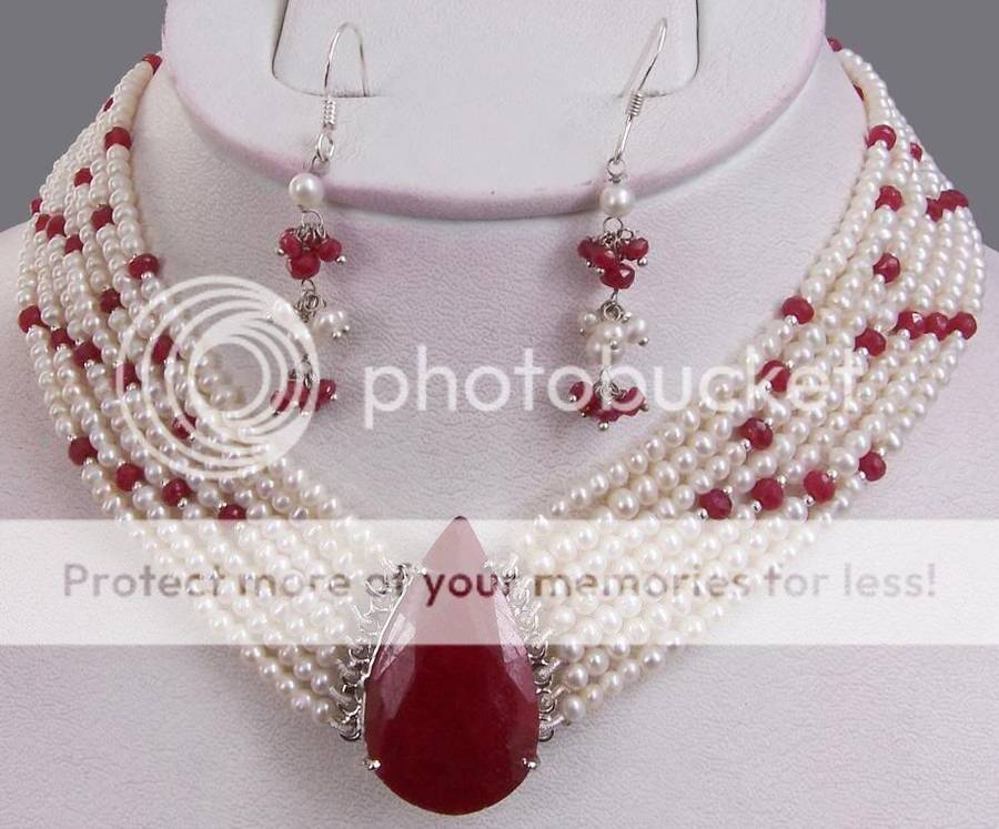 Designer 7 strand Pearl and Ruby necklace with 925 silver Ruby clasp cum pendant