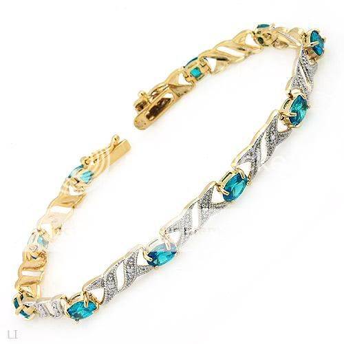 **R1900.00**5.51ctw Precious Stones - Genuine Diamond and Topazes in 14K/925 Gold plated Silver