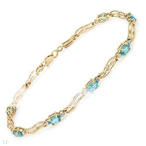 2.11ctw Diamond and Topaz 4.20g 10K Yellow Gold Bracelet