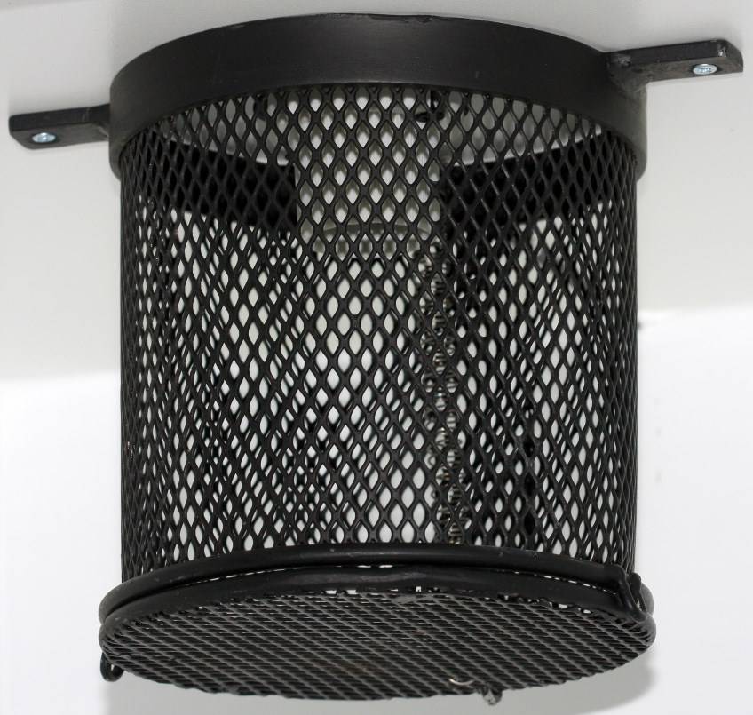 Spring loaded mesh light cover