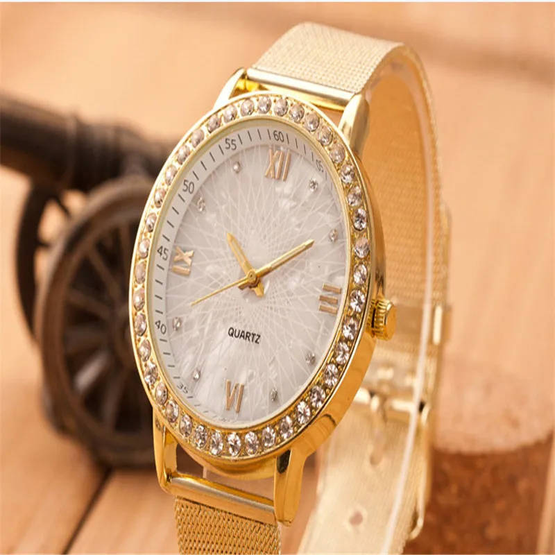Ladies Crystal Roman Numerals Gold Mesh Band Watch.