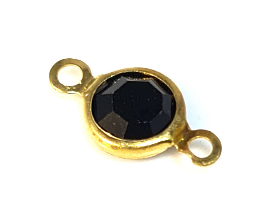Rhinestone spacer, black, nickel free, gold base, 7x13mm