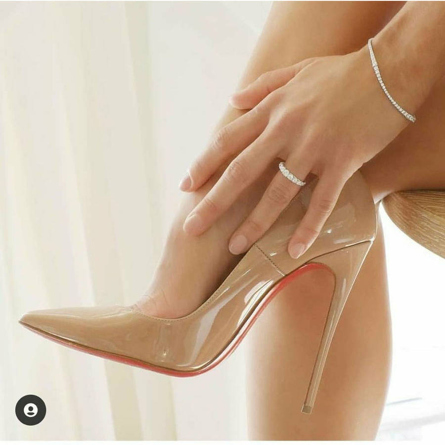 Red bottom stiletto Heel Pumps.