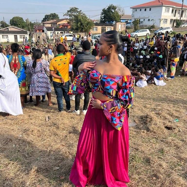 High Waisted Pleated Skirt and Long Sleeve Crop Top