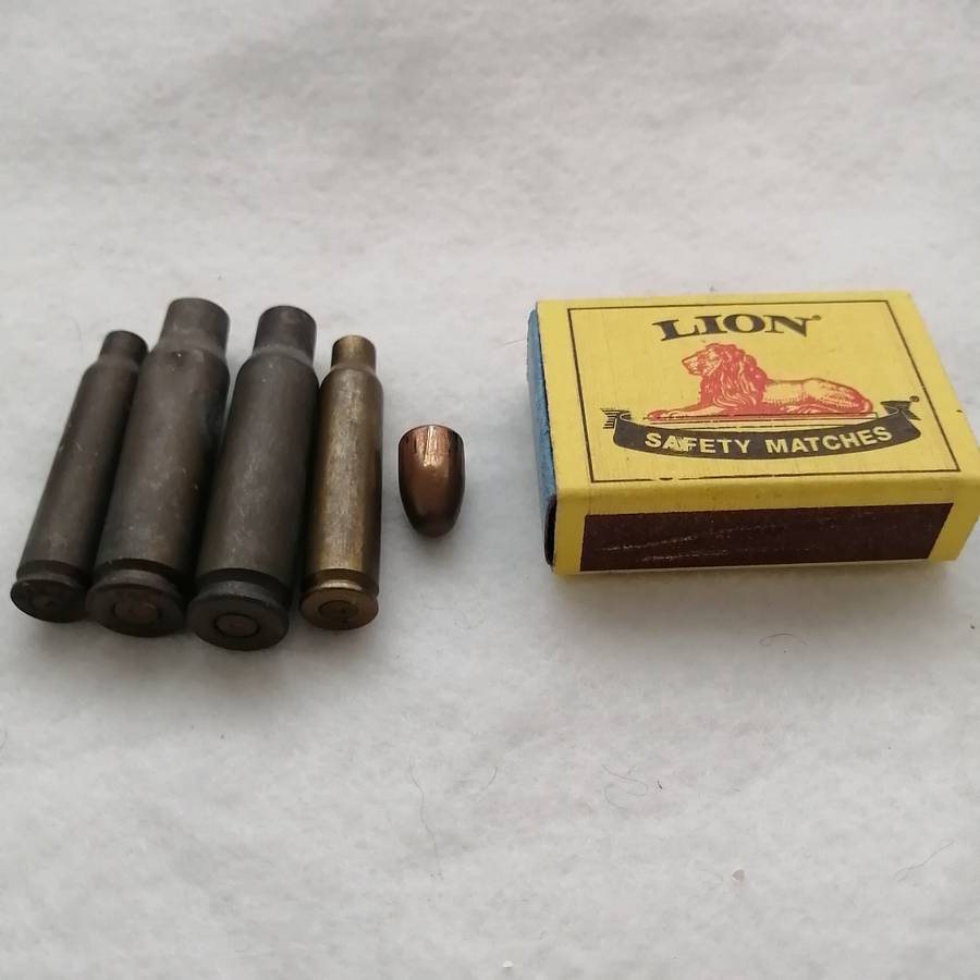 Bullet Shells (4) and 1 Projectile