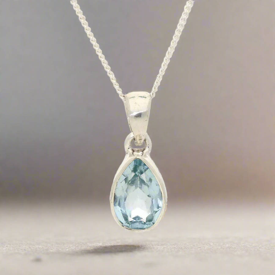 Graceful Blue Topaz Teardrop in Sterling Silver