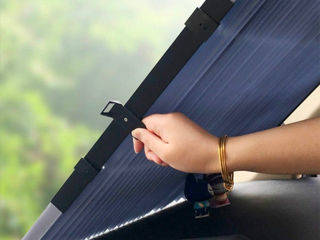 Sun shade for the windshield. On suction cups.