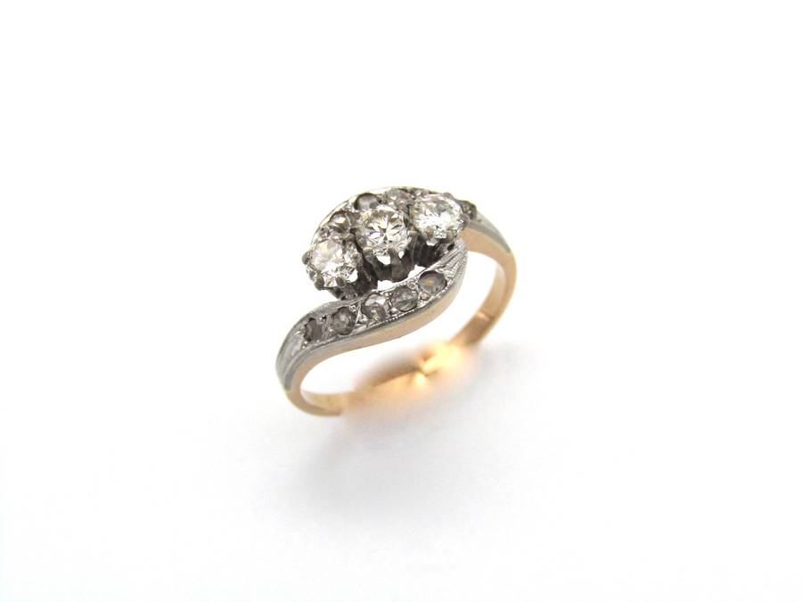 Mid-century, 18K gold trilogy diamond bypass ring