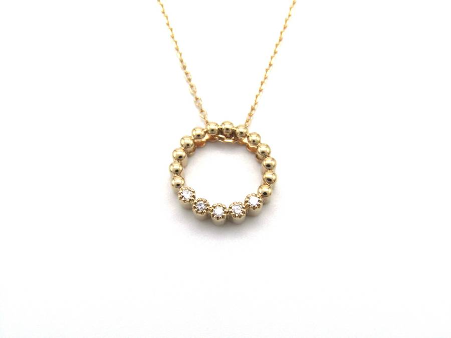 Estate, 9K gold diamond 'circle' pendant