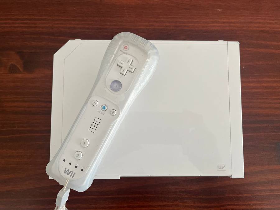 Nintendo Wii with controller, charger, etc.