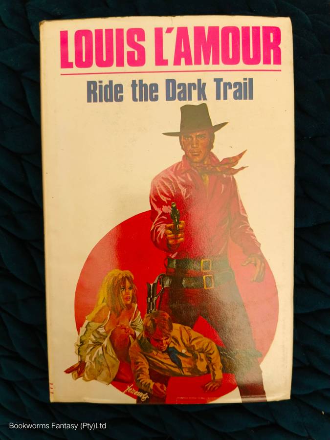 Ride the Dark Trail by Louis L'Amour