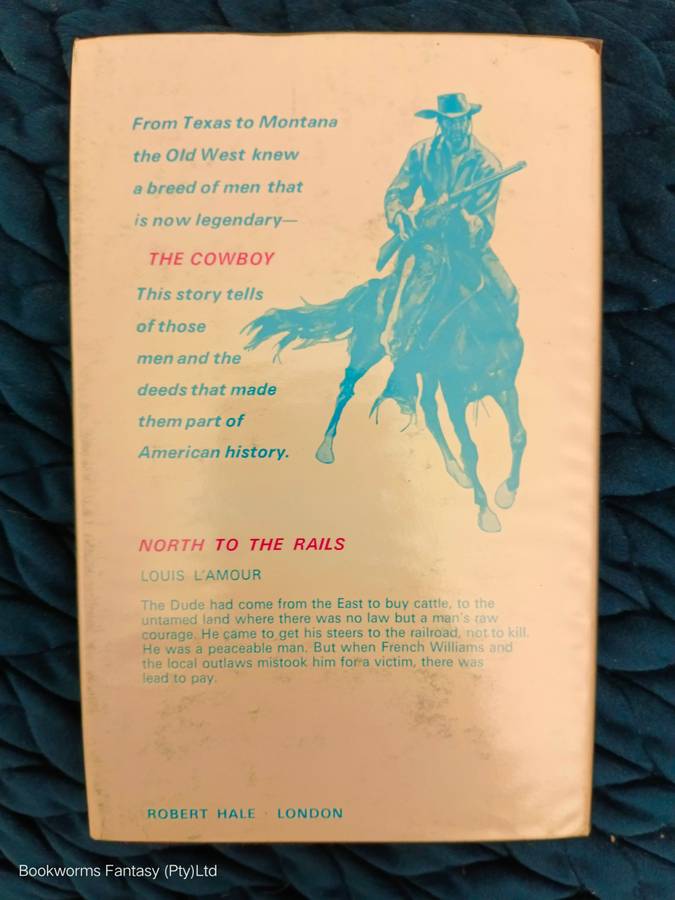 Ride the Dark Trail by Louis L'Amour