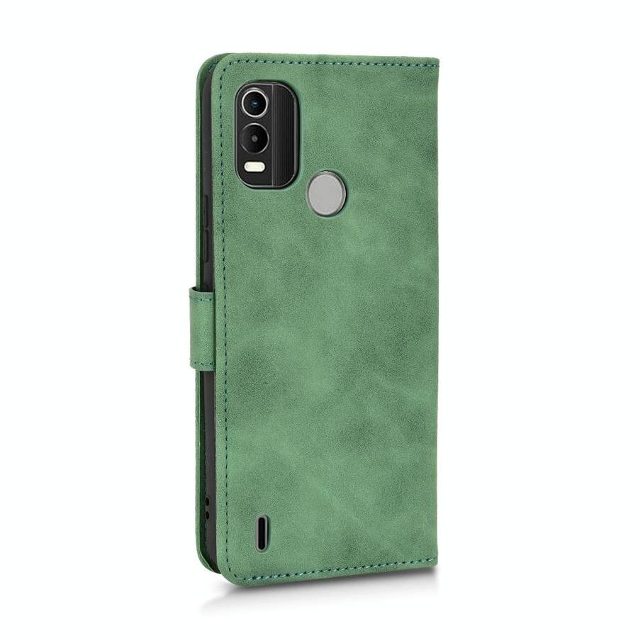 For Nokia C21 Plus Skin Feel Magnetic Flip Leather Phone Case(Green)