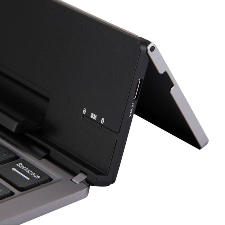 F18 Ultra-slim Rechargeable Foldable 58 Keys Bluetooth Wireless Keyboard with Holder