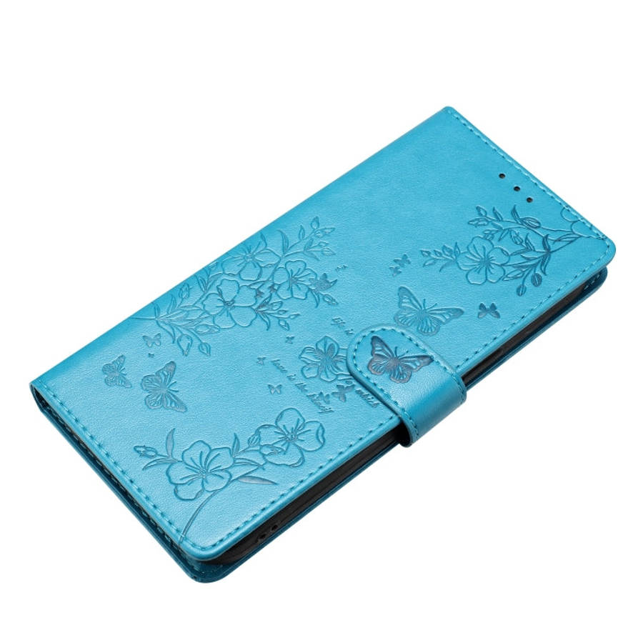 For Motorola Moto E13 Butterflies and Flowers Leather Phone Case(Blue)