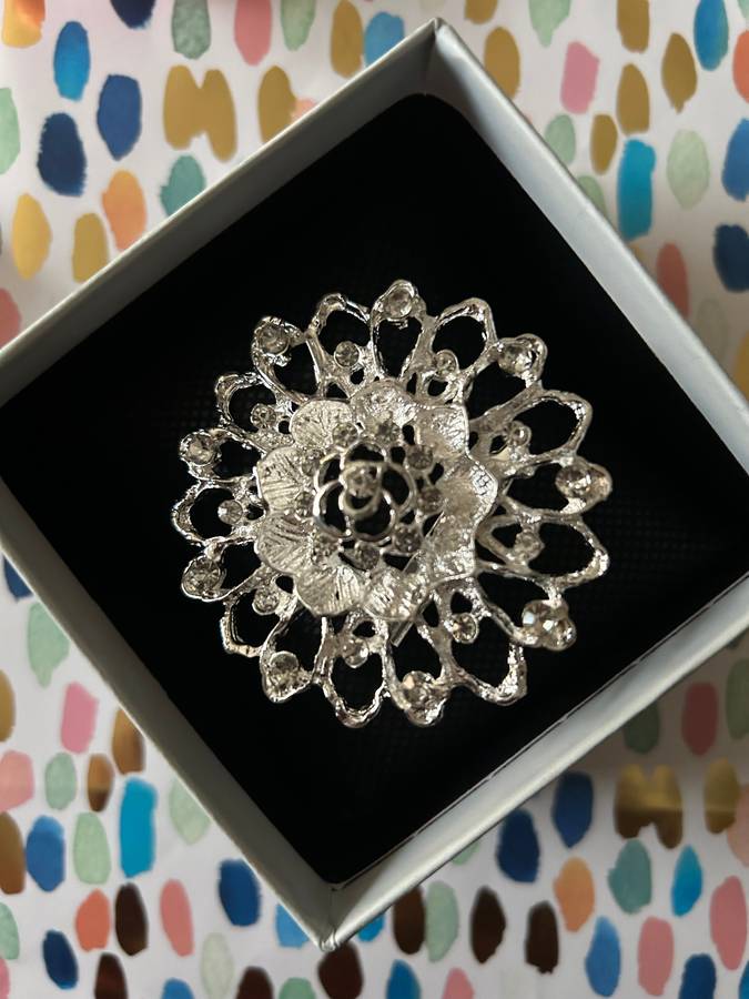 Diamante brooch cake decorating