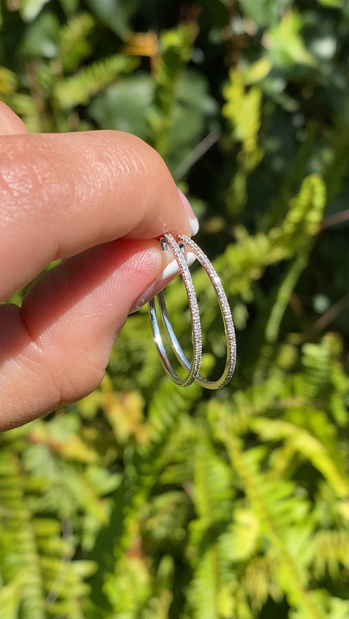 9K gold diamond hoop earrings.