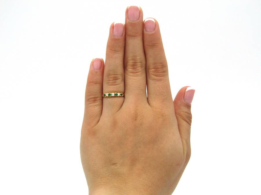 18K gold emerald and diamond ring.