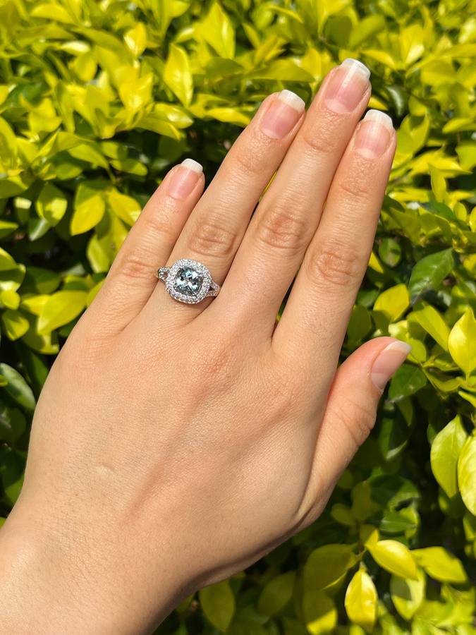 14K gold aquamarine and diamond double halo ring by Browns.