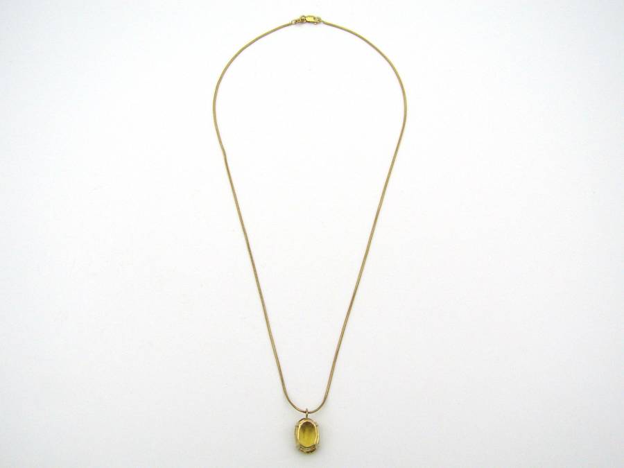 9K gold citrine pendant.