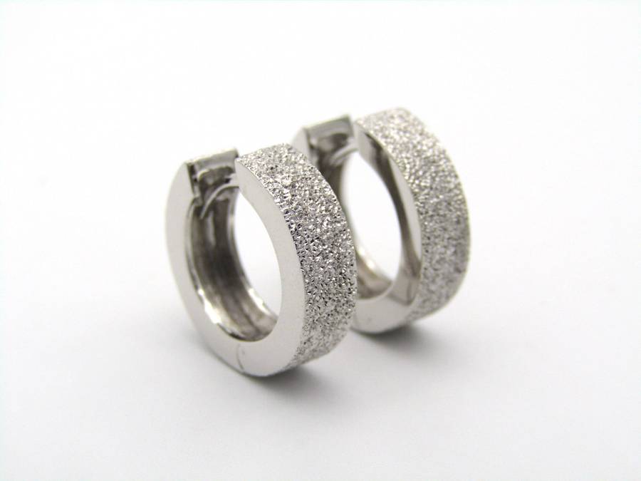 9K gold huggie earrings.