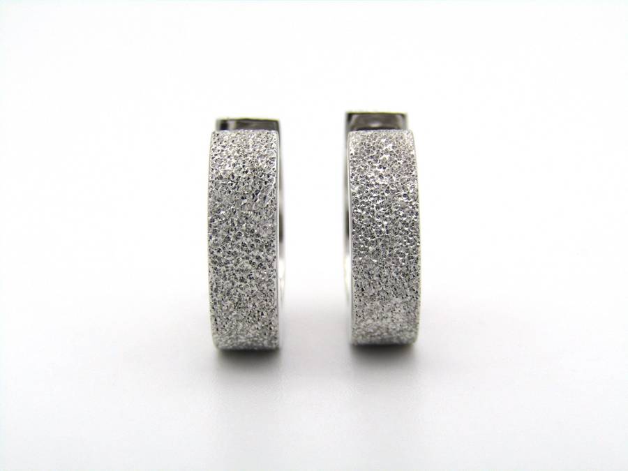 9K gold huggie earrings.