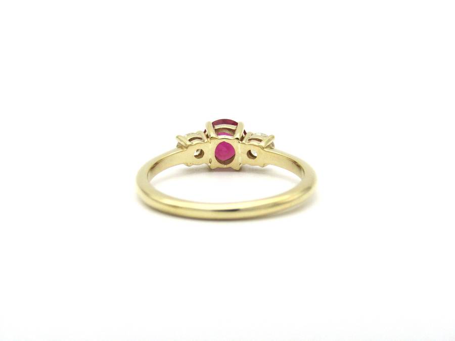 14K gold ruby and diamond trilogy ring.