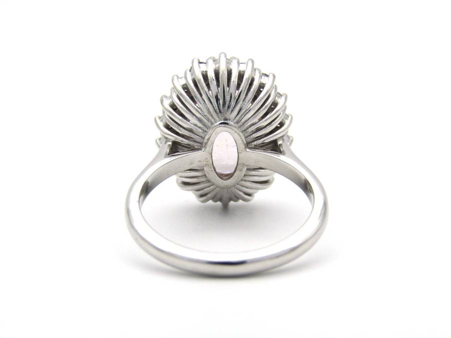 18K gold morganite and diamond halo ring.