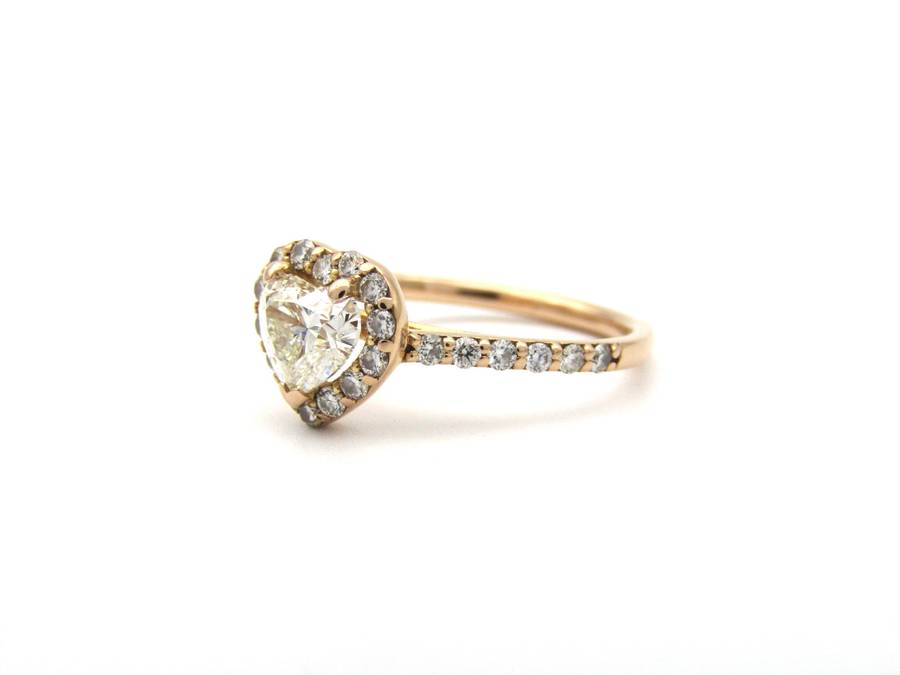 18K gold heart-shaped diamond halo ring.