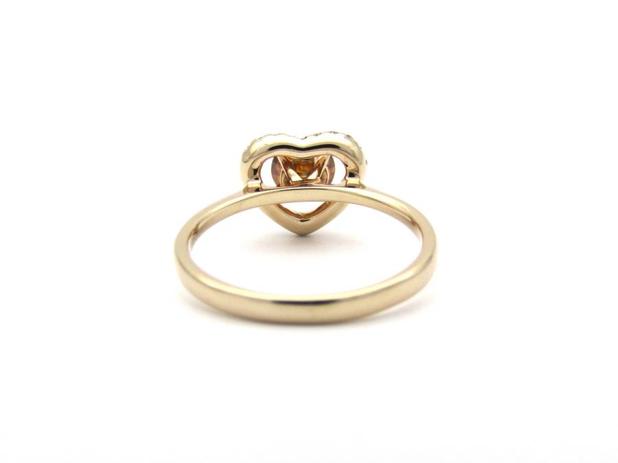 18K gold Orange diamond halo ring.