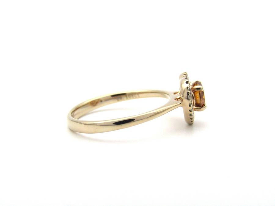 18K gold Orange diamond halo ring.