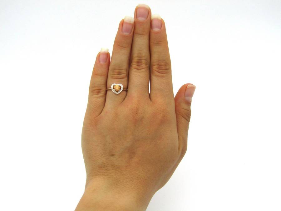 18K gold Orange diamond halo ring.