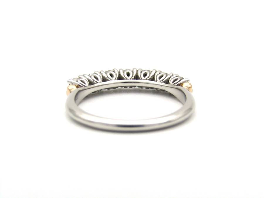 Platinum and 18K gold diamond Protea half eternity ring by Browns.