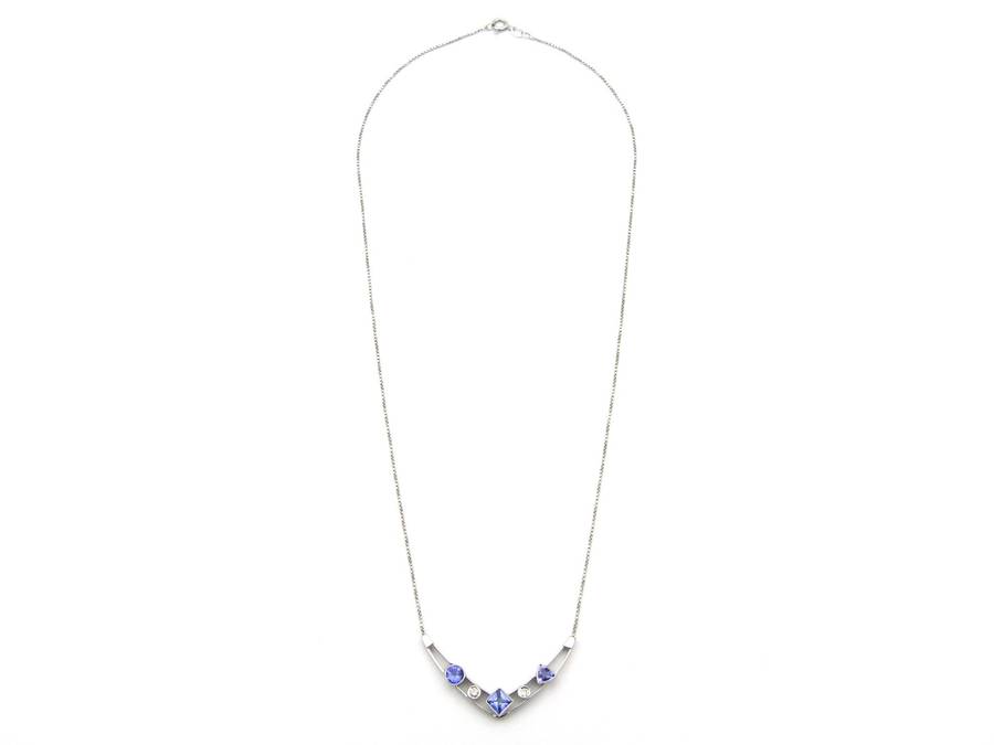 18K gold tanzanite and diamond necklace.
