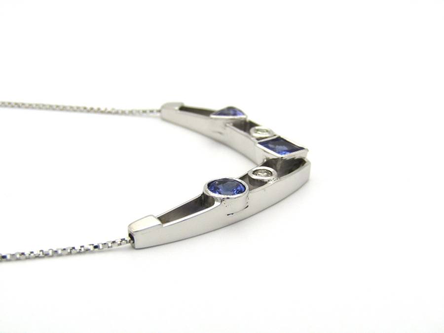 18K gold tanzanite and diamond necklace.