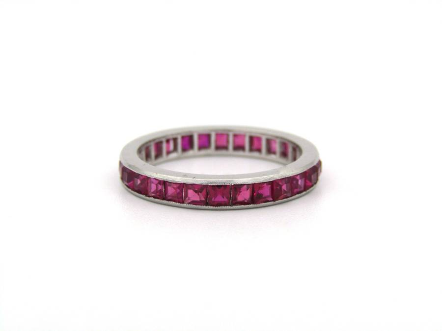 Platinum synthetic ruby eternity ring, circa 1990's.