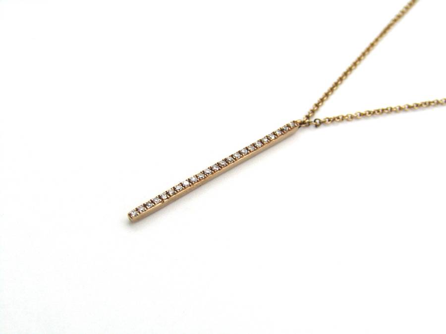 9K gold diamond bar necklace.