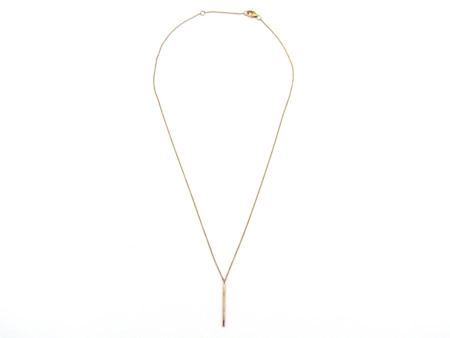 9K gold diamond bar necklace.