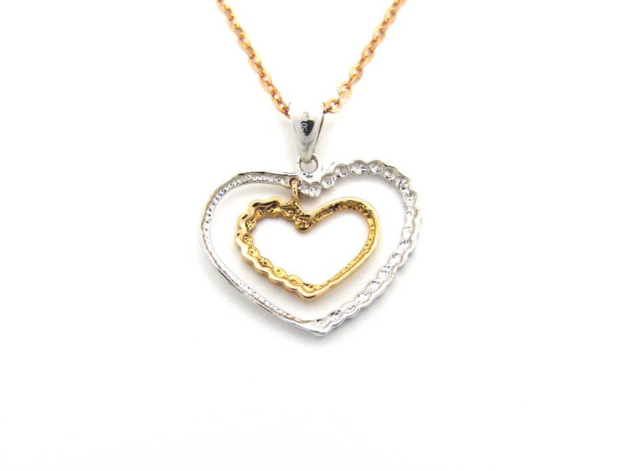 18K gold double-heart pendant.