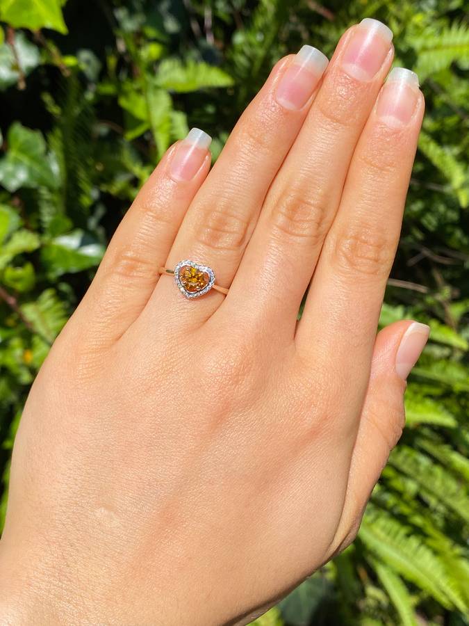 18K gold Orange diamond halo ring.