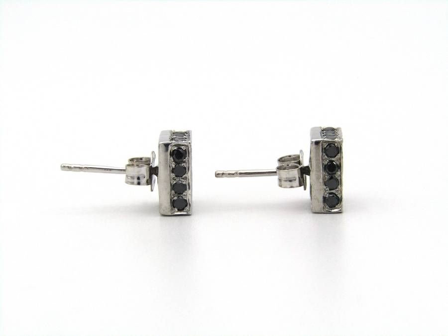 18K gold black and colourless diamond earrings.