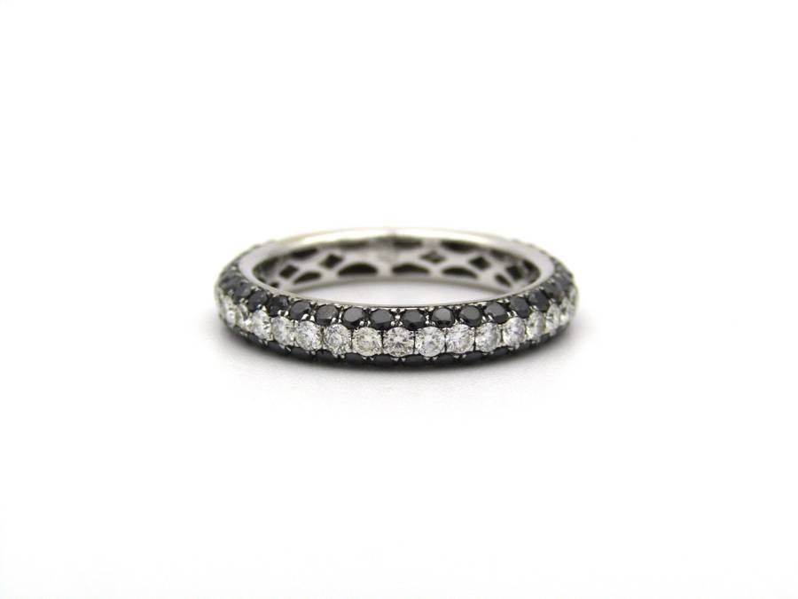 18K gold black and colourless diamond ring.