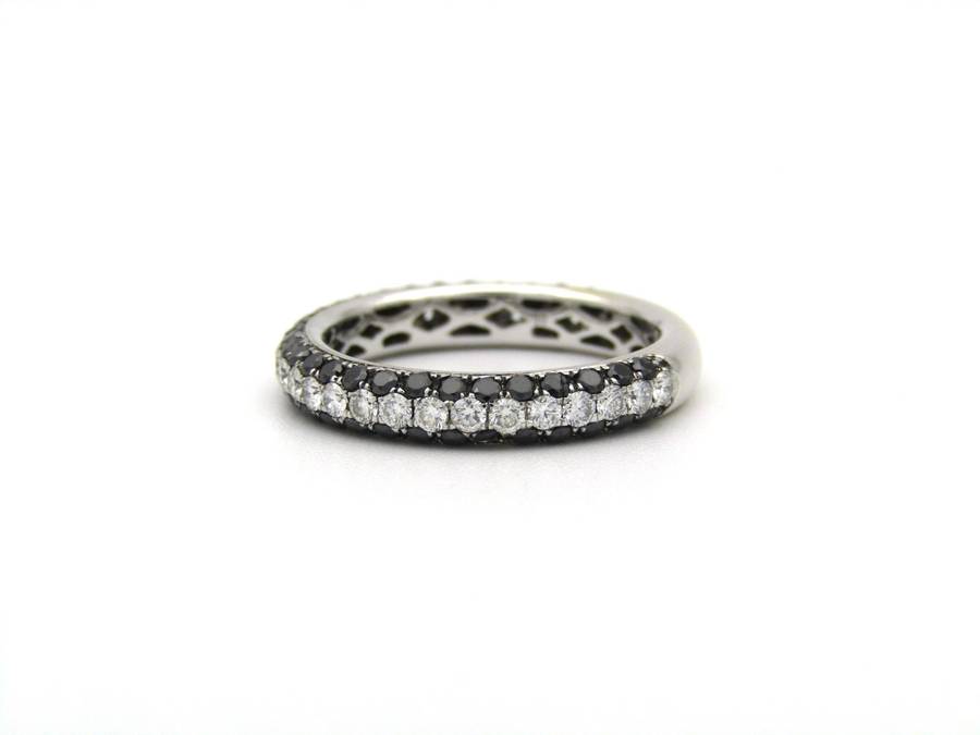 18K gold black and colourless diamond ring.