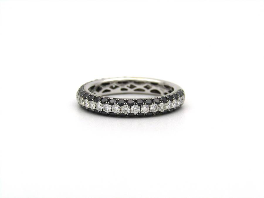 18K gold black and colourless diamond ring.