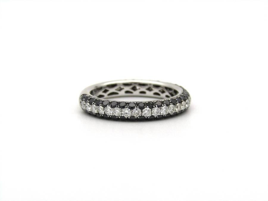 18K gold black and colourless diamond ring.